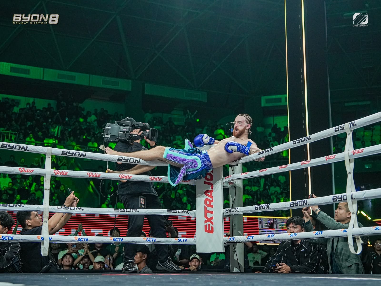 Aaron Clarke celebrates on the ropes after his win at Byon Combat Showbiz 8 in Jakarta